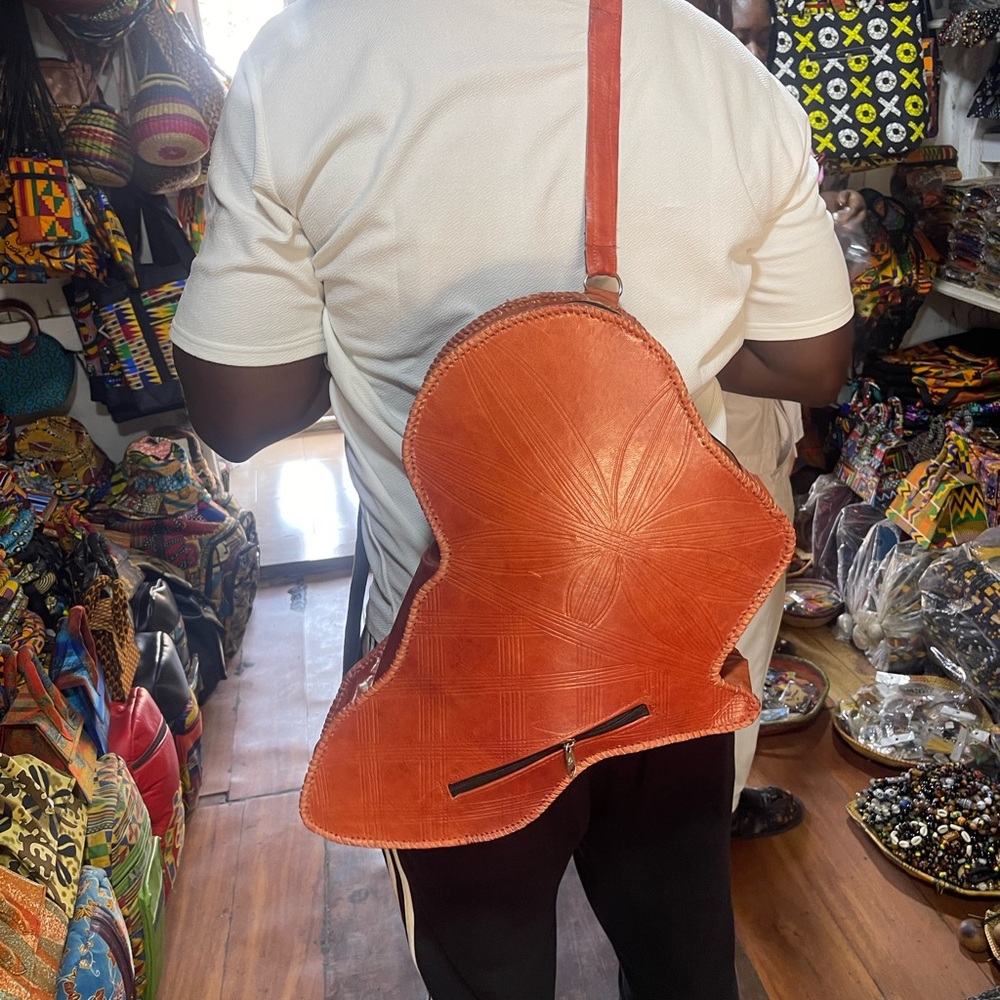 Stylish brown Leather unisex Bag leather Africa shaped backpack or crossbody